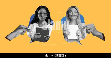Deux femmes faisant des grimaces avec des stylos dans la bouche, fond de bureau Banque D'Images