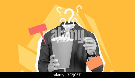 Personne non identifiable tenant un seau à popcorn avec des points d'interrogation sur fond jaune, concept de snack Banque D'Images