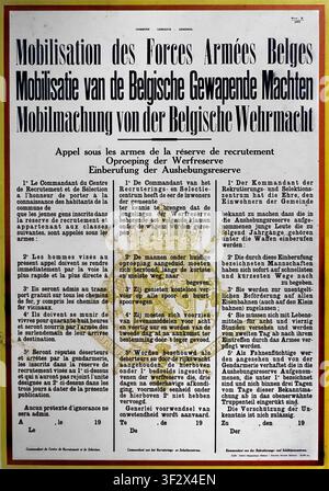 Affiche de mobilisation multilingue de la Seconde Guerre mondiale instruisant les réservistes belges de la Seconde Guerre mondiale à se présenter immédiatement, rédigée en français, néerlandais et allemand Banque D'Images