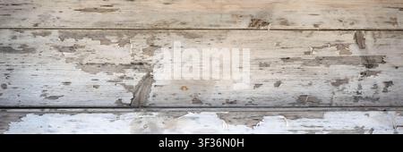 Texture de fond panoramique de vieilles planches de bois avec de la peinture écaillée Banque D'Images