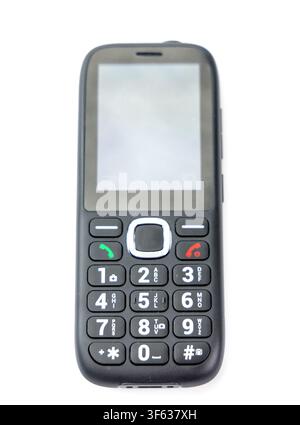 Une vue rapprochée d'un téléphone portable classique noir à bouton-poussoir isolé sur fond blanc Banque D'Images