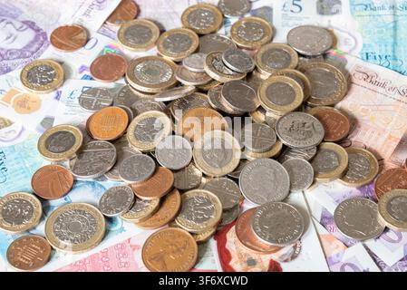 Billets et pièces en livres britanniques Banque D'Images