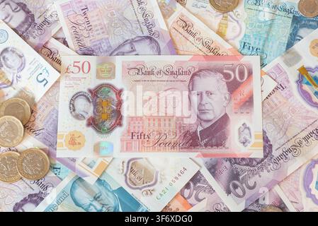 Billets et pièces en livres britanniques Banque D'Images