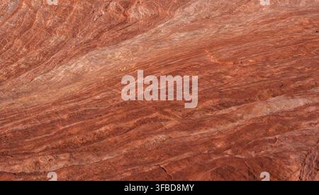Texture rayée de la vague de feu dans la Vallée de feu. Banque D'Images