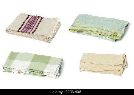 Linge plié serviettes de cuisine sur fond blanc, ensemble Banque D'Images