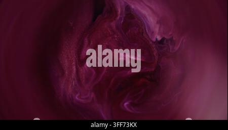 Flou éclat vif. Mélange de teintes vives. Peinture pailletée violet-rose eau texture ronde vibrante cercle sur fond d'art abstrait. Banque D'Images