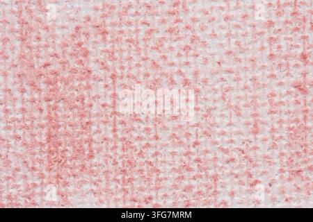 Texture en gros plan sans couture tissu toile rose pâle ou matériau tissé grossier avec grille naturelle douce Banque D'Images