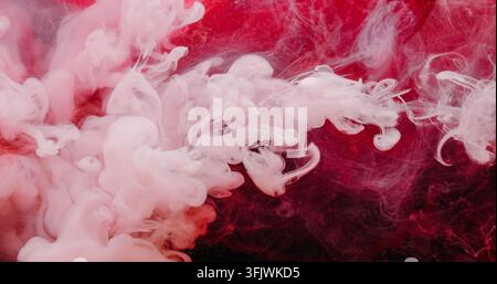 Mélange de peinture fumée goutte explosion couleur d'eau nuage art Banque D'Images