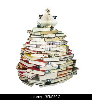 Arbre de Noël concept fait de livres sur fond blanc Banque D'Images