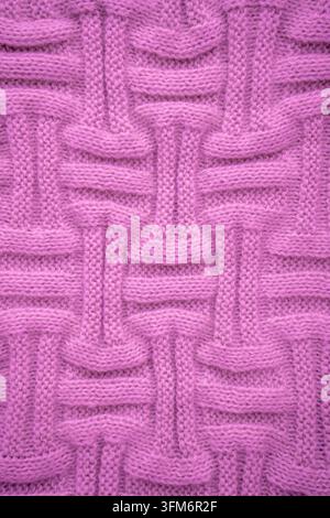 Texture rose Tissu tricot fond pull en laine. Banque D'Images
