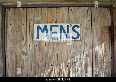 Panneau de toilettes pour hommes peint à la main Banque D'Images