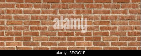 Maçonnerie de briques rouges vieilles, formant une large surface murale rustique avec des lignes de mortier pâles Banque D'Images