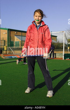 Teenage girl hockey player Banque D'Images