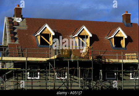 Maisons en construction sur un site de terrain brown, Sewen, Suffolk, UK. Banque D'Images