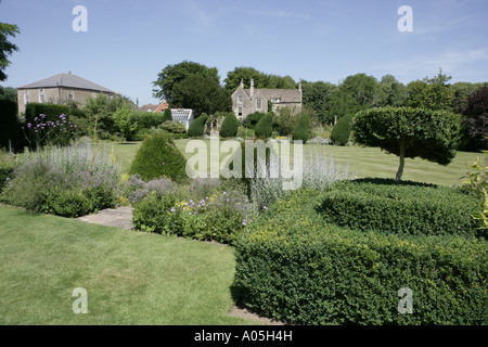 Les tribunaux Gardens at Holt très anglais, l'exemple et le style à est le meilleur de tous. Banque D'Images