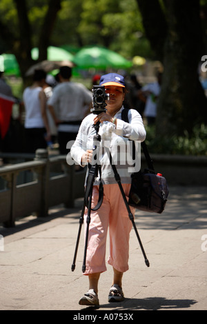 Photographe chinois, touristiques Putuoshan, Chine. Banque D'Images