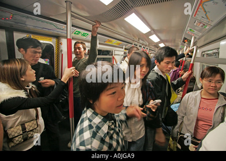 Chine Hong Kong les gens bondés du Métro Banque D'Images