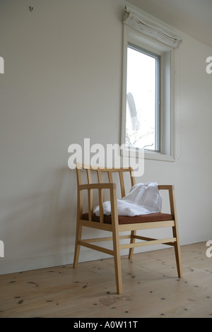 Chaise vide dans un salon Banque D'Images