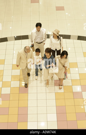 High angle view of a family walking in a shopping mall Banque D'Images