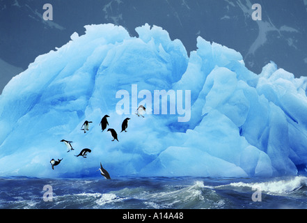 Manchots adélies sur bleu iceberg Antarctique Banque D'Images