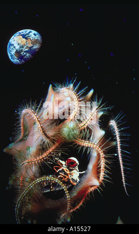 Illustration par ordinateur d'un astronaute dans l'espace l'exploration d'une forme de vie extraterrestre avec la terre dans l'espace dans la distance Banque D'Images