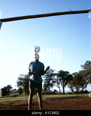 African boy playing football Banque D'Images