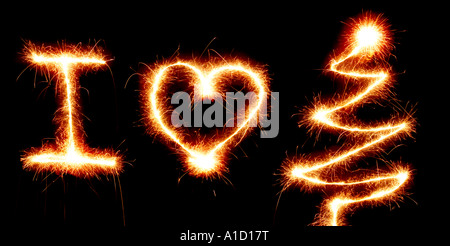 J'aime les symboles de Noël fait avec sparkler lights isolé sur la découpe noire Banque D'Images