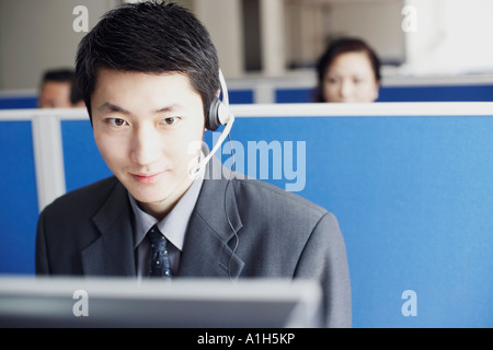 Portrait of a businessman wearing a headset Banque D'Images