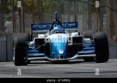 Bruno Junqueira, of Belo Horizonte, Brazil, guides his Ford-Cosworth Lola  for Neman/Haas Racing through the nine turn of the course of the Grand Prix  of Denver with other racers behind him on