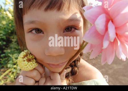 Close-up of Girl with Flower Banque D'Images