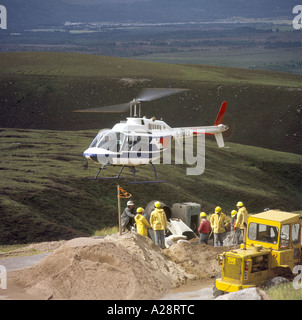Agusta Bell AB-206B Jetranger 2 Transport de ciment pour le site du centre de ski écossais. GAVM 2066-214 Banque D'Images