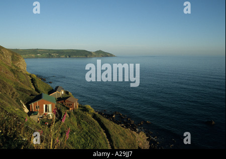 Rame sur la tête avec Whitsand Bay chalets au premier plan sur le Cornwall UK Banque D'Images