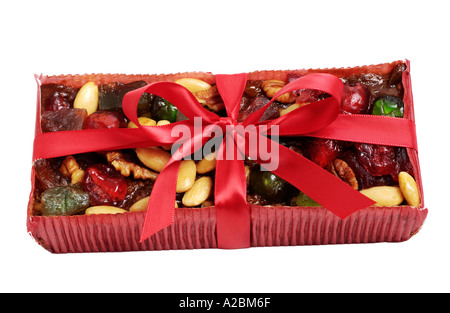 Gâteau aux fruits enveloppés dans red bow Banque D'Images