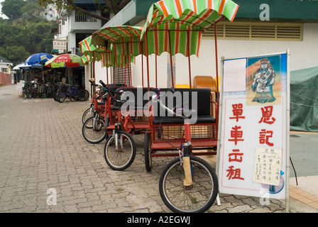 Dh Cheung Chau HONG KONG Rickshaw triporteurs pour voitures de transport de l'île Banque D'Images