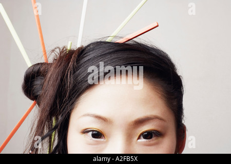 Portrait d'une jeune femme avec une coiffure Banque D'Images