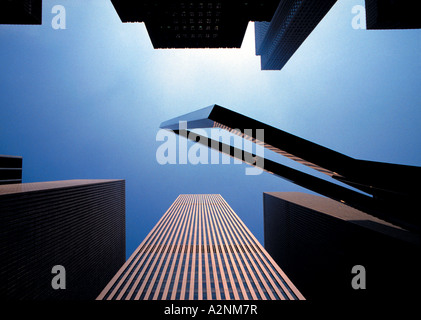 Low angle view of buildings in city, Sixième Avenue, New York City, New York State, USA Banque D'Images