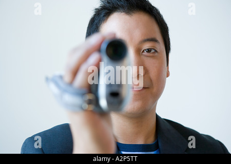 Homme avec caméra vidéo Banque D'Images