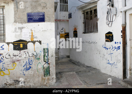 Photos sur les murs de maisons syriennes qui propriétaires hadj à La Mecque en Arabie Saoudite, l'île d'Arwad près de Tartous, en Syrie, au Banque D'Images