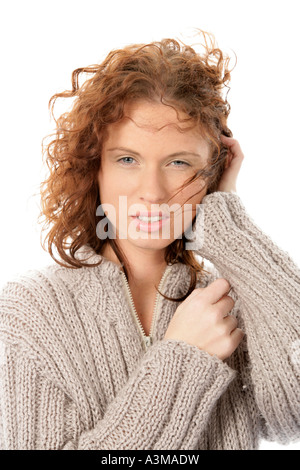 Jeune femme avec des cheveux de soufflage Banque D'Images