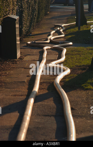 Service d'incendie Les tuyaux flexibles Banque D'Images