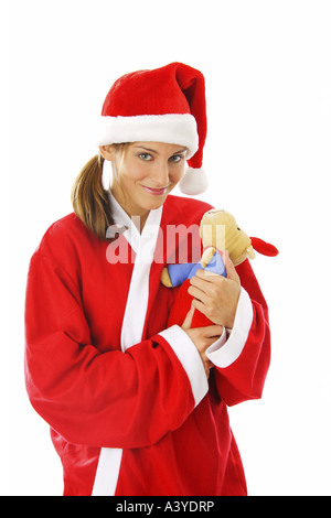 Jeune femme en costume de Père Noël avec soft toy elk Banque D'Images