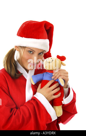 Jeune femme en costume de Père Noël avec soft toy Banque D'Images