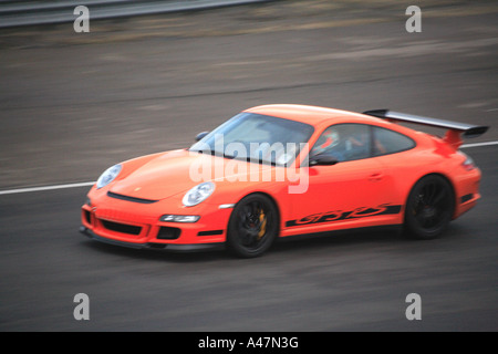 Porsche GT3 RS orange voiture de course de la piste de vitesse rapide motor sport racing Banque D'Images