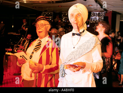 Fancy dress party on cruise ship QE2 Banque D'Images