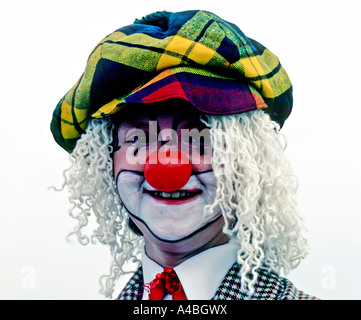 Clown face contre fond blanc Wales UK Banque D'Images