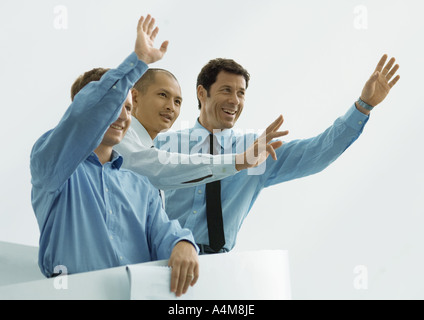 Trois hommes d'ondulation Banque D'Images