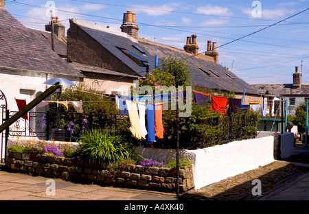 Les chalets et les vêtements en ligne Footdee, Aberdeen, Ecosse Banque D'Images