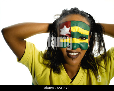 Femme avec le Togo flag painted on face, close-up, portrait Banque D'Images