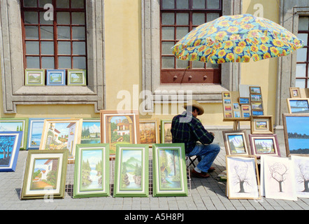 Vente de peintures de l'homme dans la rue, Plazza Hidalgo, Mexico. Banque D'Images