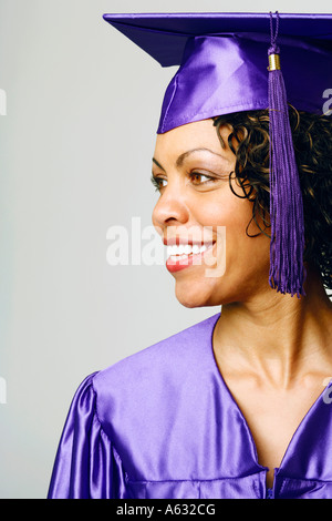Close-up of a female graduate smiling Banque D'Images